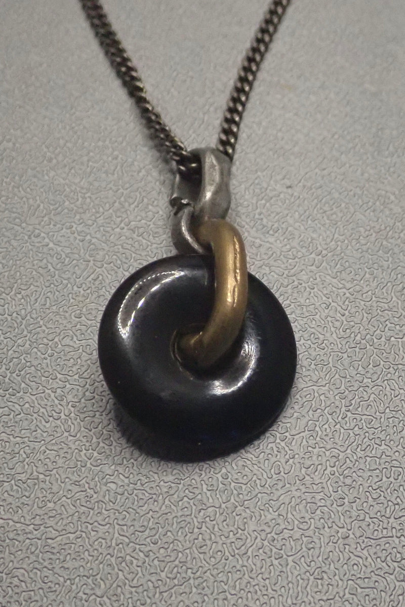 BLACK ONYX DISC PENDANT