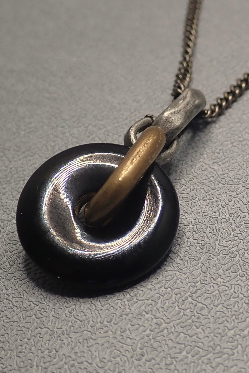 BLACK ONYX DISC PENDANT