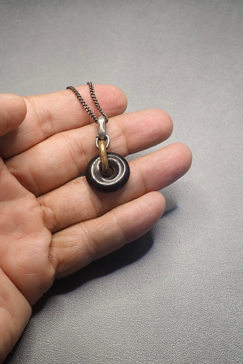 BLACK ONYX DISC PENDANT