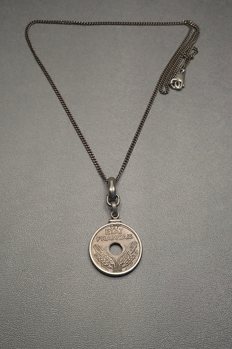 HOLE COIN PENDANT