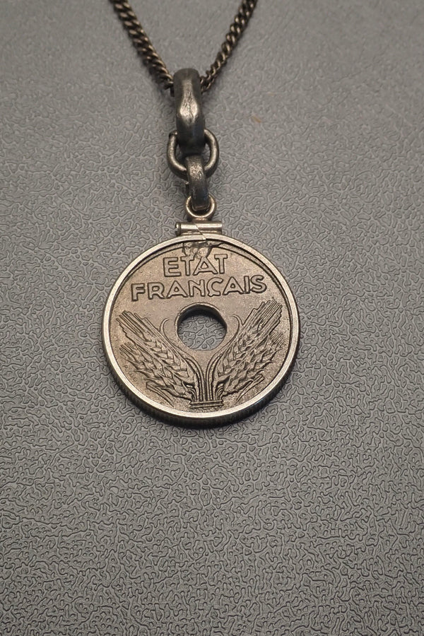 HOLE COIN PENDANT