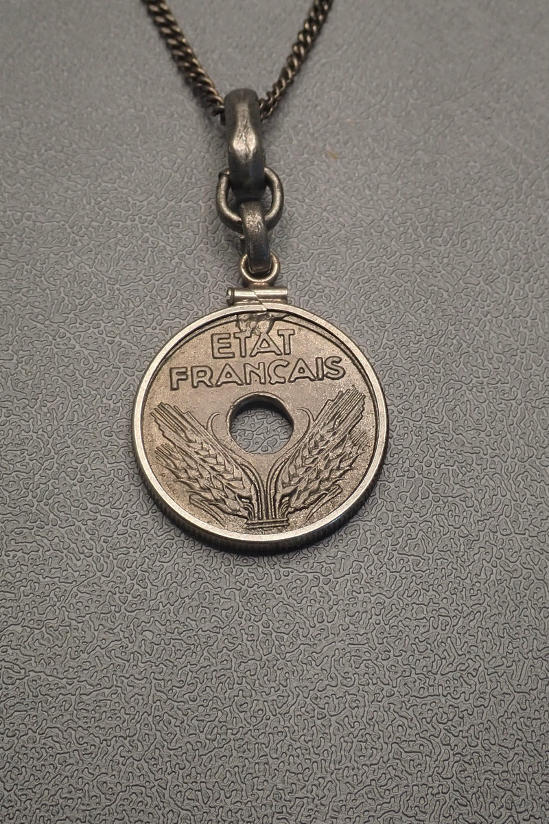 HOLE COIN PENDANT