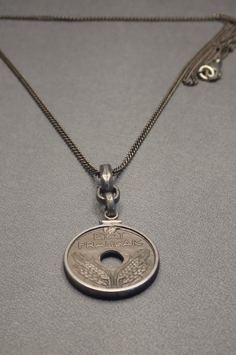 HOLE COIN PENDANT