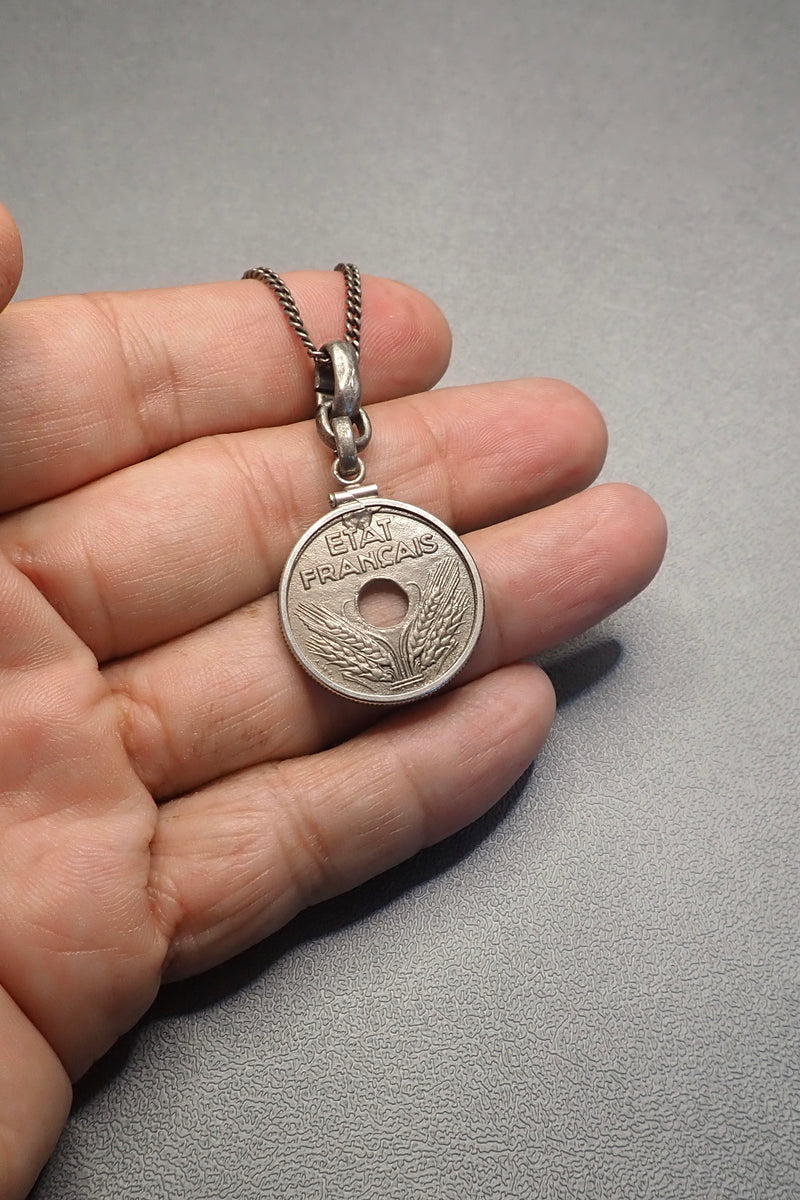 HOLE COIN PENDANT