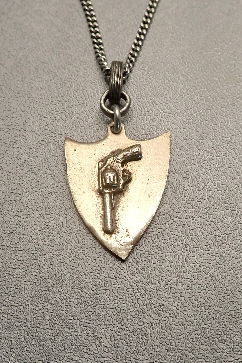 REVOLVER SHIELD PENDANT