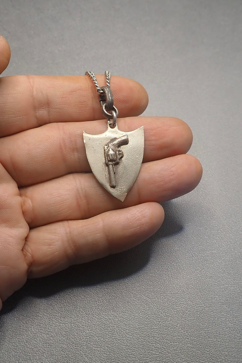 REVOLVER SHIELD PENDANT